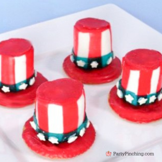 Patriotic marshmallow hats, uncle Sam marshmallow hats, 4th of July marshmallow hat cupcake cake toppers, easy 4th of July marshmallow hats ritz cracker marshmallow fruit roll ups