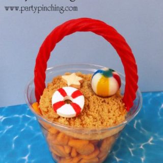 summer snack ideas, goldfish crackers, cute summer food, beach theme party ideas, cute beach pail snack take and go, easy summer snack, cute snack for beach theme party, summer treat idea, crafty food for kids, partypinching.com