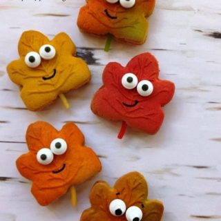 leaf cookies, harvest party ideas, fall cookies, autumn cookies, cute leaf cookies with candy eyes, canada cookies, maple leaf cookies, cute food, fun harvest party Halloween Thanksgiving ideas for kids