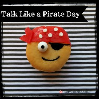 talk like a pirate day cookie, national pancake day root beer pancakes, national creamsicle day, raspberries & cream day, gets squished breast cancer awareness month cupcake, national Pi day, march madness cookie, colombus day donut, national banana day