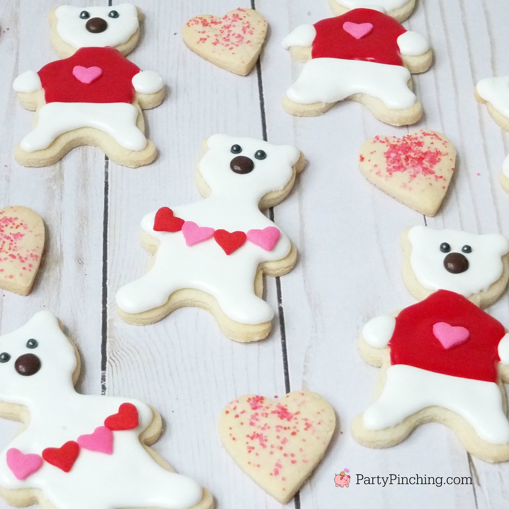 Polar bear cookies, Valentine's Day polar bear cookies, cute cookie ideas for Valentine's Day, polar bear sweater cookie, polar bear heart garland cookie, fun food for kids, cute food ideas, sweet treats