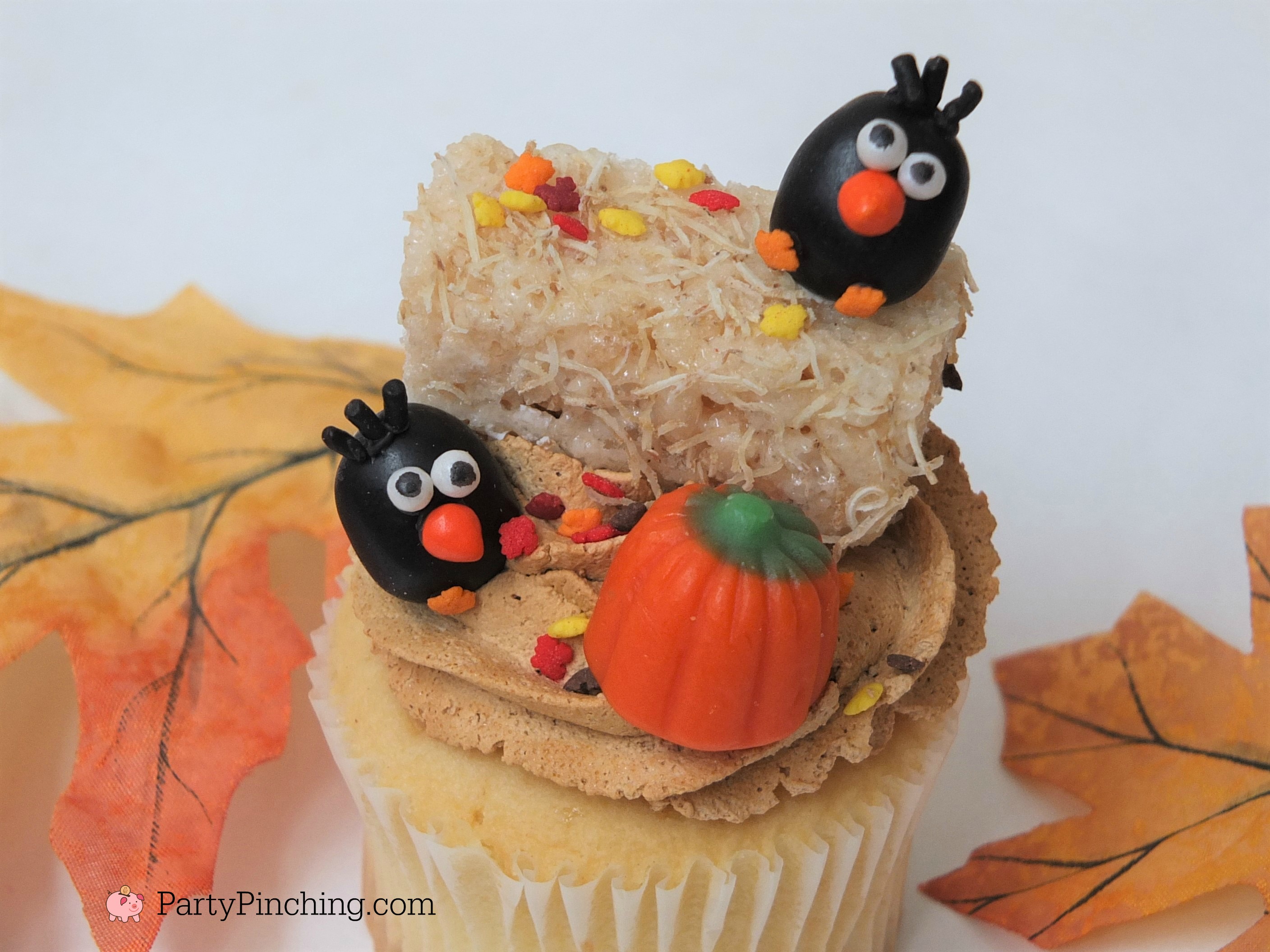 crow cupcakes, adorable autumn fall cupcakes, jelly bean crows, cute food, fun food for kids, hay bale cupcakes rice krispie haybales with leaf sprinkles, ask for whipped, caramel whipped icing frosting, harvest party ideas, thanksgiving cute dessert