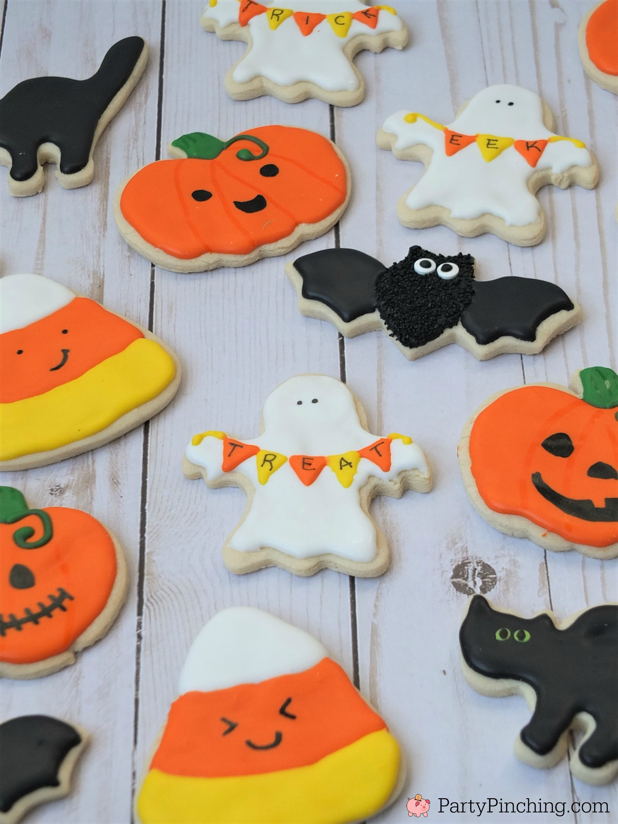 Halloween sugar cookies decorated royal icing, ghost banner cookies, cute Halloween cookies, black cat cookies, bat cookies, cute candy corn cookies, cute pumpkin jack o lantern cookies