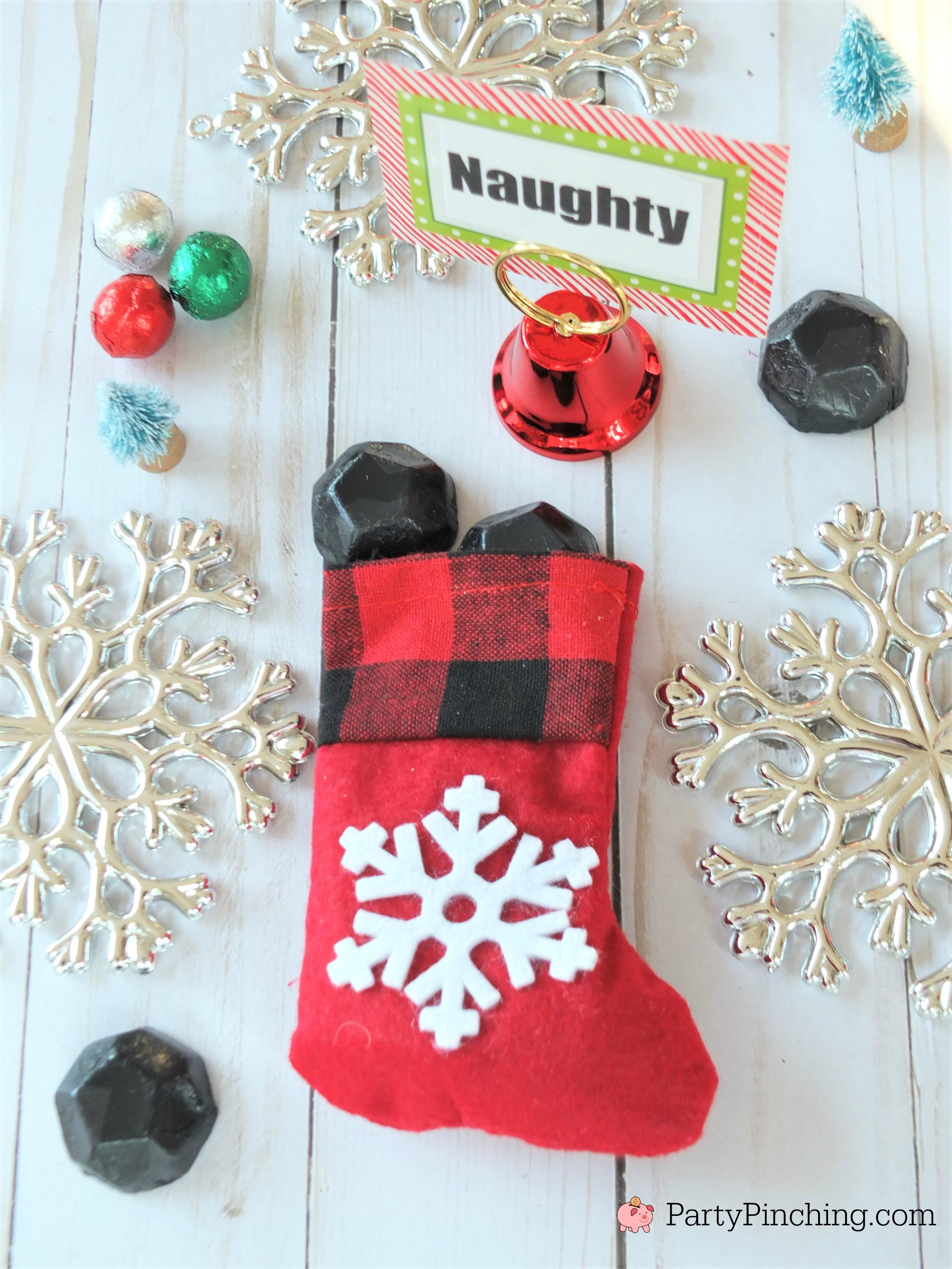 naughty and nice ideas for Christmas stockings, Christmas table setting ideas, cute Christmas dinner table ideas for the kids and family, lumps of coal candy, cute stocking stuffer ideas