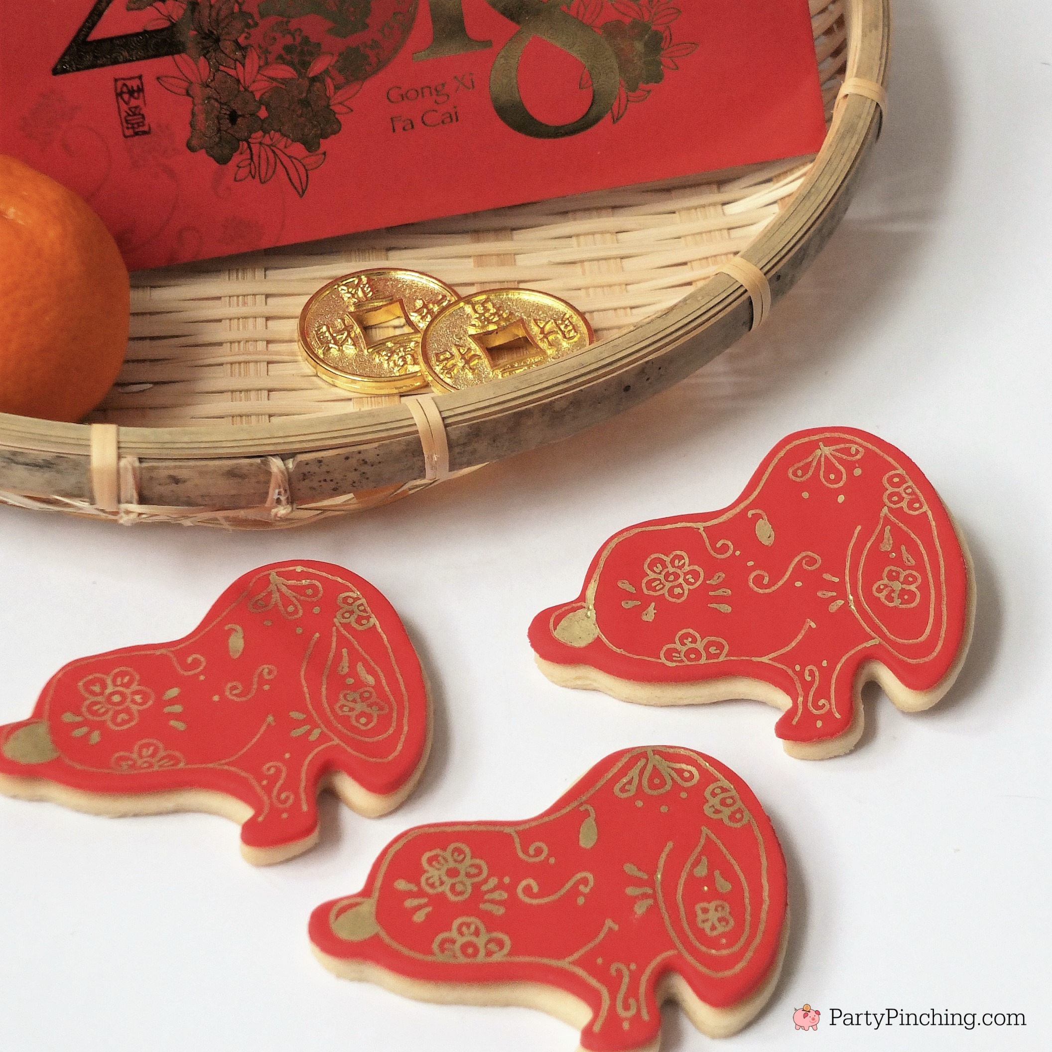 Lunar New Year, Chinese New Year, Year of the Dog, Snoopy cookies, Peanuts Cookies, Red and gold cookies, dessert ideas for Chinese New Year, Dog cookies, pretty celebration cookies, painted cookies