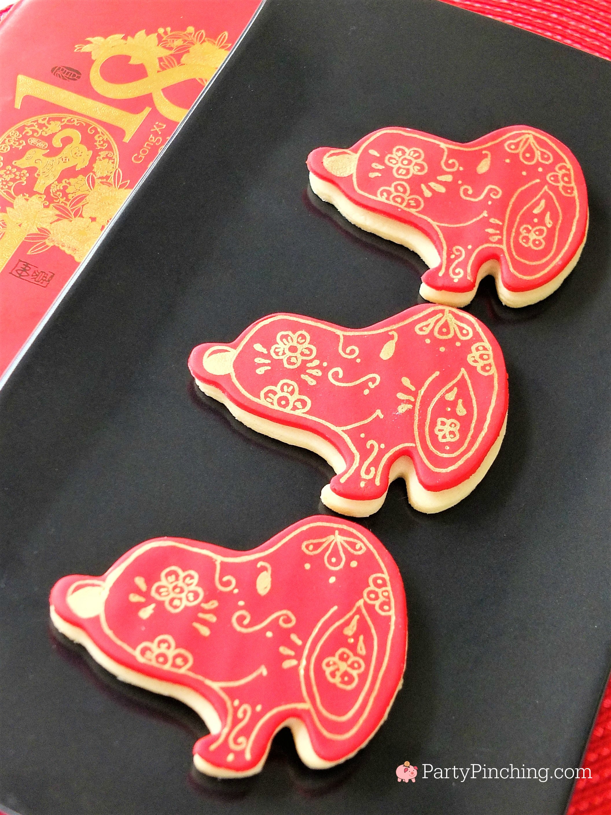 Lunar New Year, Chinese New Year, Year of the Dog, Snoopy cookies, Peanuts Cookies, Red and gold cookies, dessert ideas for Chinese New Year, Dog cookies, pretty celebration cookies, painted cookies