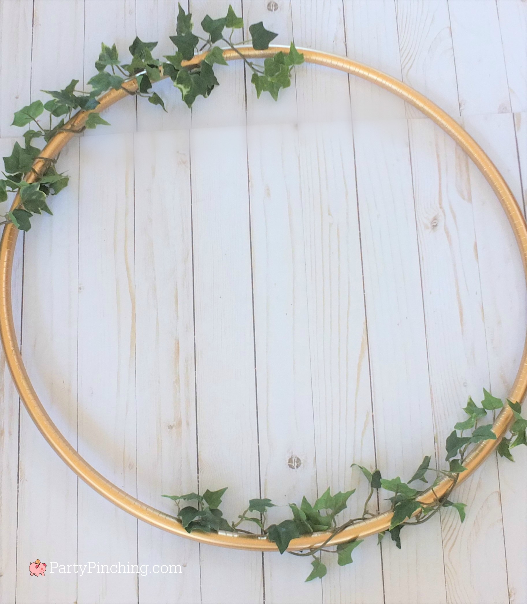 photo wreath, hula hoop wreath, DIY wedding wreath, DIY photo wreath, dollar store wreath, pretty hoop decoration, inexpensive party decor, easy budget friendly wedding bridal shower baby shower graduation birthday special occasion celebration ideas