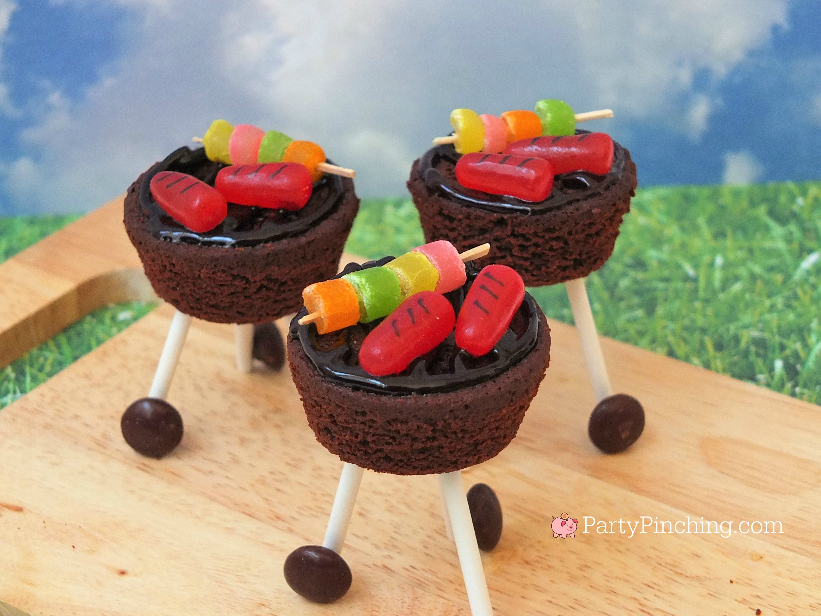 brownie outdoor grill, brownie grill bites, BBQ brownie grill with candy hot dog and skewers, candy skewer, candy grilled hot dogs, charcoal grill dessert brownies, sweet treat picnic BBQ brownies with wheels, kettle BBQ brownies