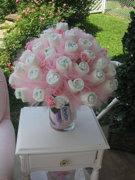 pretty DIY baby diaper rose bouquet with tulle, baby shower ideas, cute baby shower, best baby shower ideas, baby shower cake, fun games for baby shower, baby shower food