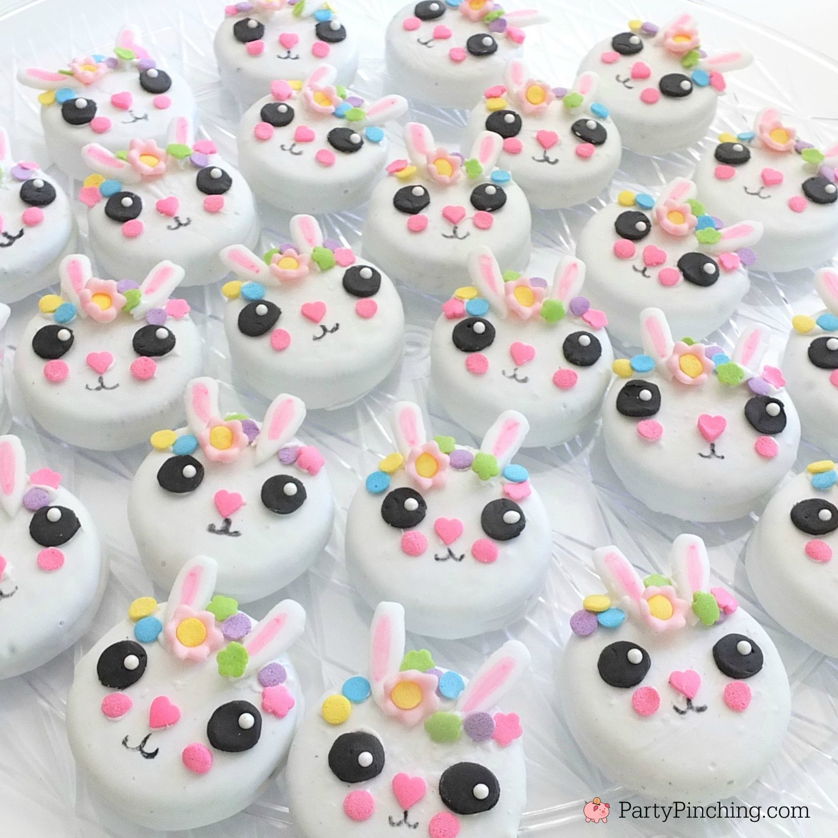 bunny oreos, bunny cookies, bunny cake, bunny cake with flower crown, cute kawaii bunny cake, fun easy bunny cake for Easter, sweet treats for kids, adorable rabbit cake, bunny cake with floral buttercream fondant, oreo bunny cookies, candy coated easter bunny cookies flower crown