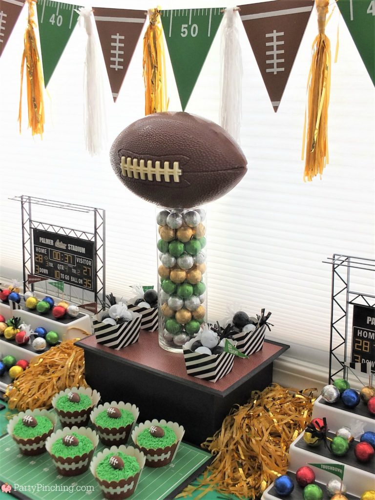 Game time treats, football dessert ideas, football centerpiece, football dessert table, football chocolate, football cupcakes, snack stadium, food football dessert stadium, fan choclolate stadium, football game play chalk peanut butter cups, referee chocolate treats, chocolate football centerpiece, life size chocolate football, party pinching, rm palmer candy