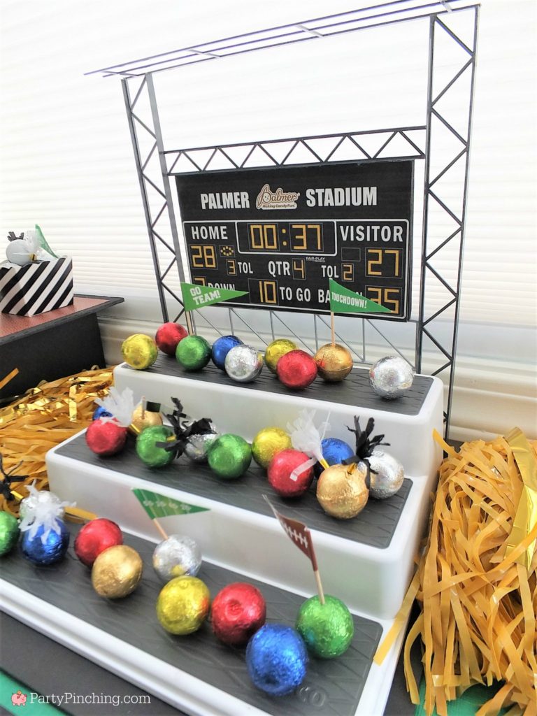 Game time treats, football dessert ideas, football centerpiece, football dessert table, football chocolate, football cupcakes, snack stadium, food football dessert stadium, fan choclolate stadium, football game play chalk peanut butter cups, referee chocolate treats, chocolate football centerpiece, life size chocolate football, party pinching, rm palmer candy