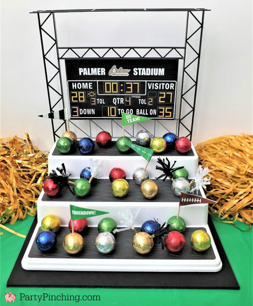 Game time treats, football dessert ideas, football centerpiece, football dessert table, football chocolate, football cupcakes, snack stadium, food football dessert stadium, fan choclolate stadium, football game play chalk peanut butter cups, referee chocolate treats, chocolate football centerpiece, life size chocolate football, party pinching, rm palmer candy