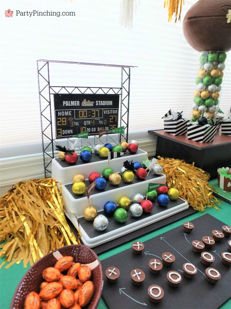 Game time treats, football dessert ideas, football centerpiece, football dessert table, football chocolate, football cupcakes, snack stadium, food football dessert stadium, fan choclolate stadium, football game play chalk peanut butter cups, referee chocolate treats, chocolate football centerpiece, life size chocolate football, party pinching, rm palmer candy