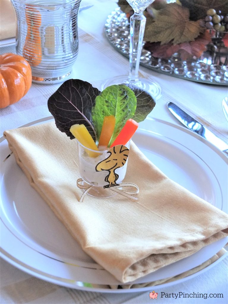 Charlie Brown Thanksgiving, Snoopy Thanksgiving, Woodstock salad appetizer Thanksgivivng table, Peanuts theme Thanksgiving dinner snack dessert ideas for kids adults, Snoopy popcorn jelly bean toast pretzel snack dinner Thanksgiving, Woodstock salad, Thanksgiving dinner table setting ideas, Thanksgiving tablescape