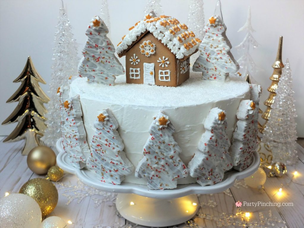 winter wonderland holiday spice cake, beautiful elegant Christmas cake, show stopping centerpiece cake for Christmas party, gingerbread house Christmas cake, mini gingerbread house Little Debbie winter tree cake, winter tree cake, snow scene cake, winter snowy cake, sparkling snow cake, white and gold cake, easy simple to make cake fast to create