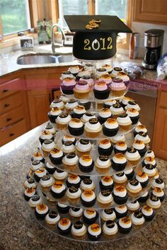 grad cupcake tower, Graduation Marquee Cake, Best Graduation Party Food Ideas, food grad guests will love, fun easy graduate party food buffets, grad food drink bars, best graduation cakes cupcakes desserts cookies, fun graduation open house food, inexpensive cheap grad party ideas for teens, partypinching.com