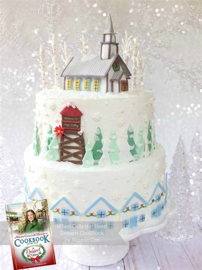 Hope Valley Christmas Cake, When Calls the Heart, Hallmark Channel, WCTH, Hearties, #Hearties, When Calls the Heart Food and Party Ideas, Canadian Recipe Ideas, Best Canadian Desserts, Little House on The Prairie, Party Pinching, Norene Cox Author, Hope Valley, church cake, winter cake, water tower cake, beautiful winter scene cake
