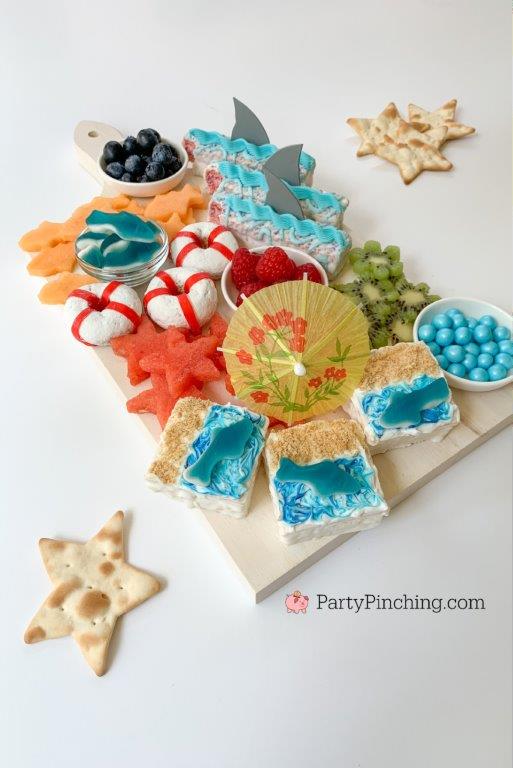 Shark-cuterie Board, best charcuterie board ideas for kids, best charcuterie board, cute charcuterie boards, best fruit trays, summer charcuterie, best summer charcuterie, shark week, shark fruit board, shark food, best shark party ideas, Little Debbie summer, Party Pinching, shark week food, shark week
