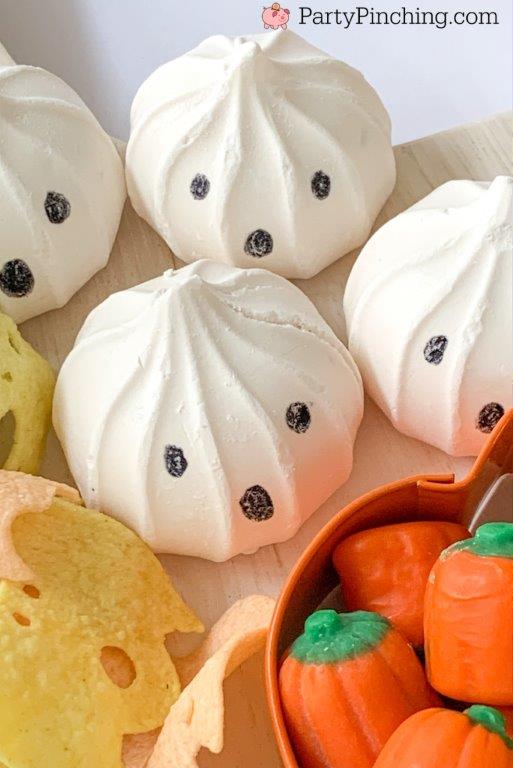 trader joe's vanilla meringue cookie ghosts, halloween charcuterie, spook-cuterie board, best charcuterie board ideas, easy charcuterie board, charcuterie for kids, halloween partie ideas, easy best charcuterie board ideas, healthy charcuterie board for kids