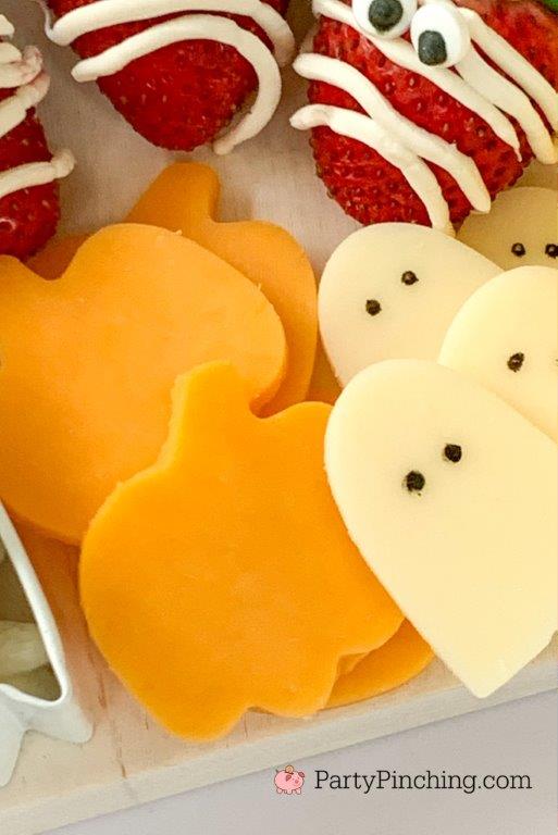 pumpkin ghost cheese, halloween charcuterie, spook-cuterie board, best charcuterie board ideas, easy charcuterie board, charcuterie for kids, halloween partie ideas, easy best charcuterie board ideas, healthy charcuterie board for kids