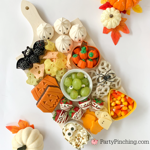 cookie cutter pumpkin candy, halloween charcuterie, spook-cuterie board, best charcuterie board ideas, easy charcuterie board, charcuterie for kids, halloween partie ideas, easy best charcuterie board ideas, healthy charcuterie board for kids