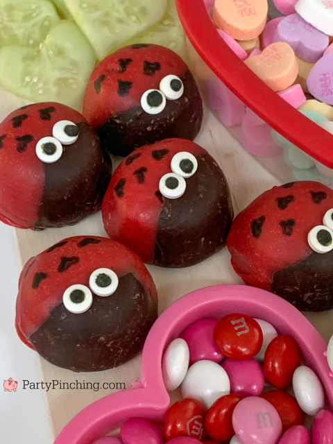 Valentine Charcuterie, best charcuterie ideas, Valentine treat ideas, cute charcuterie boards, heart charcuterie, heart treats, best kids valentine's day ideas, best valentine recipes, easy valentine recipes, easy charcuterie ideas, trader joe's chocolate covered marshmallow love bugs