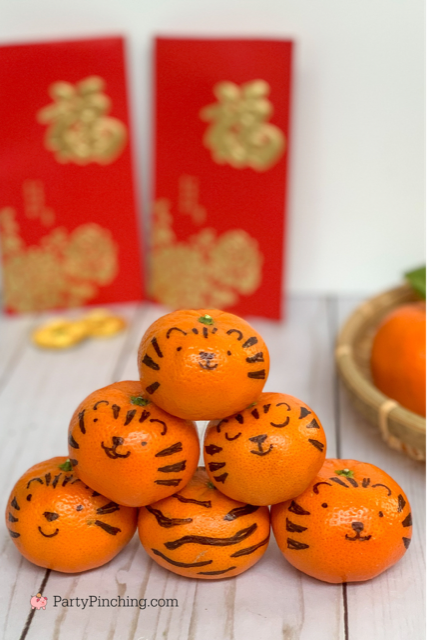 tiger mandarin oranges, chinese new year, lunar new year, best chinese new year ideas, best lunar new year ideas, year of the tiger, lucky food, lucky fruit, lucky mandarin oranges, lunar chinese new year traditions customs, lucky tiger