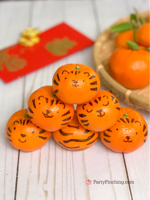 tiger mandarin oranges, chinese new year, lunar new year, best chinese new year ideas, best lunar new year ideas, year of the tiger, lucky food, lucky fruit, lucky mandarin oranges, lunar chinese new year traditions customs, lucky tiger