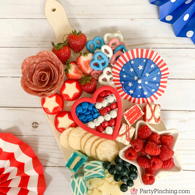 patriotic snack board, red white and blue 4th of july charcuterie board, 4th of july memorial day food ideas, 4th of july grazing board, patriotic grazing charcuterie board, best charcuterie board ideas, best charcuterie board snack board ideas for kids