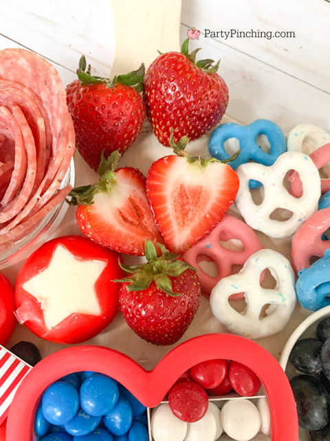 patriotic snack board, red white and blue 4th of july charcuterie board, 4th of july memorial day food ideas, 4th of july grazing board, patriotic grazing charcuterie board, best charcuterie board ideas, best charcuterie board snack board ideas for kids