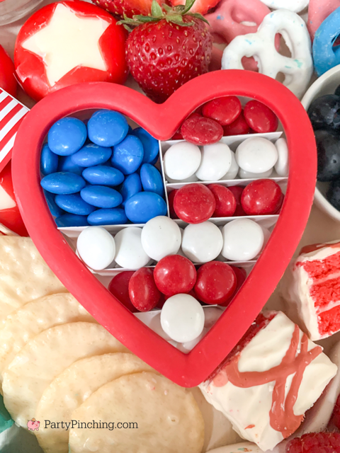 patriotic snack board, red white and blue 4th of july charcuterie board, 4th of july memorial day food ideas, 4th of july grazing board, patriotic grazing charcuterie board, best charcuterie board ideas, best charcuterie board snack board ideas for kids