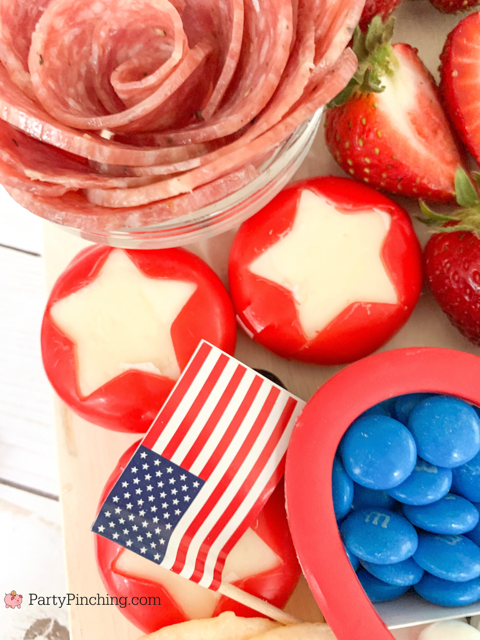 patriotic snack board, red white and blue 4th of july charcuterie board, 4th of july memorial day food ideas, 4th of july grazing board, patriotic grazing charcuterie board, best charcuterie board ideas, best charcuterie board snack board ideas for kids