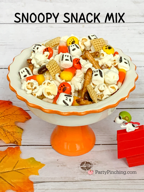 snoopy snack mix, snoopy halloween great pumpkin snack mix, chex mix for kids, popcorn snoopy marshmallows pretzels candy corn M&M's, easy snack mix for great pumpkin charlie brown movie, snoopy linus lucy charlie brown peanuts gang party food