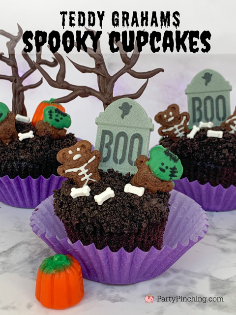 teddy graham spooky halloween cupcakes, cute teddy graham cupcakes, best cute easy to make halloween cupcakes for kids, not too spooky halloween too cute to spook halloween, best kids halloween party food ideas, best halloween graveyard cupcakes, candy tombstone cake, chocolate trees bone sprinkles, teddy graham skeletons, teddy graham frankenstein