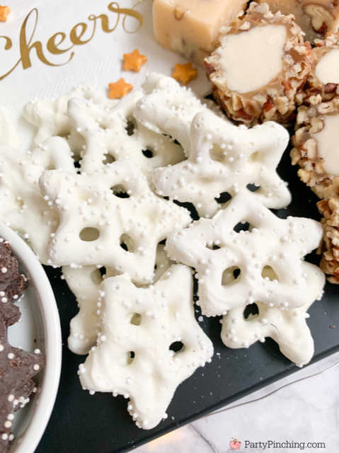 white chocolate pretzel snowflakes stars, New Years eve dessert board New Year's Eve party charcuterie board, snack board