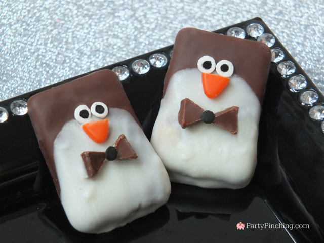 Chocolate covered graham cracker party penguins, black tie party penguin cookies, new year's eve party food desserts, best easy new Year's eve party ideas recipes, cute penguin cookies, no bake penguin cookies, no bake new Year's eve dessert ideas, chocolated covered graham cracker cookies