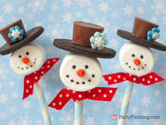 Easy to make Snowman Marshmallow pops, DIY snowman marshmallow pops, Christmas winter wonderland marshmallow pops, cute snowman marshmallows, mini reeses cups marshmallow pops, cute marshmallow pops for kids, easy best snowman treat recipe ideas for kids