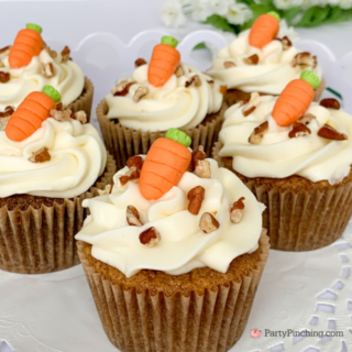 carrot cake cupcakes, absolute best carrot cake cupcakes, moist best carrot cake recipe with raisins and pecans, best ever carrot cake cupcakes with homemade cream cheese frosting, best ever cream cheese frosting, cute carrot cake cupcakes dessert for Easter, best carrot cake recipe