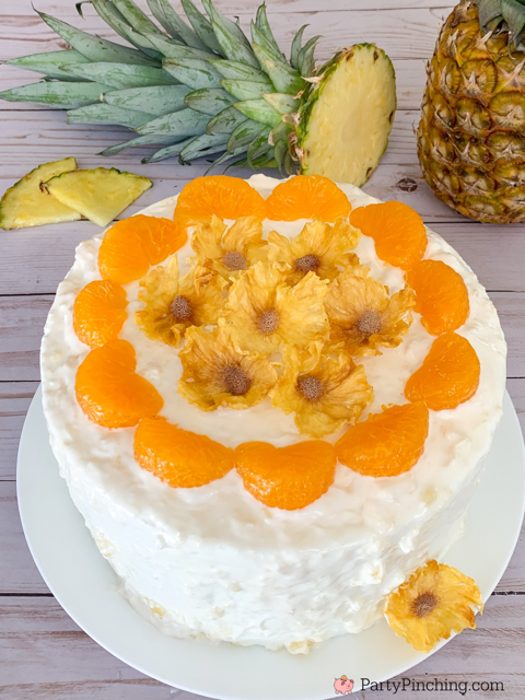 best ever pig pickin' cake with dried pineapple flowers, best sunshine cake recipe, Tobest easy pig picking cake recipe, best easy mandrin orange pineapple cake recipe ever, best southern pig pickin' cake recipe, pretty pig' picking cake recipe southern summer cake for a crowd, pineapple whipped cream frosting cool whip vanilla pudding