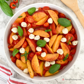 the best peach caprese summer salad, fresh peach salad, summer caprese salad, peach salad, easy best summer salad recipes, fast easy salad, fresh peaches cherry tomatos fresh basil mozzerella pearls summer salad, best picnic potluck salad ideas for a crowd,