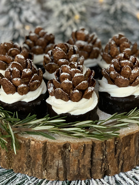 chocolate pine cone ring dings, easy to make no bake chocolate pine cone cakes with chocolate cereal powdered sugar, winter wonderland cupcakes, easy no bake winter wonderland holiday pine cone cupcakes cakes fun quick holiday treat snack