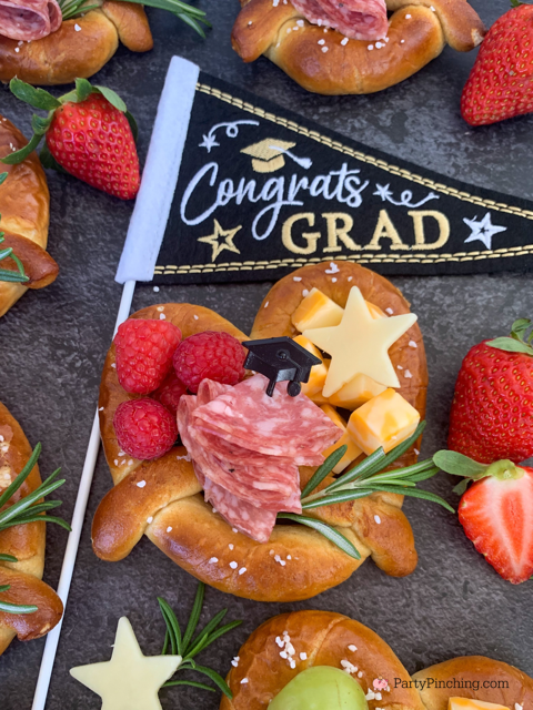 Graduation Charcuterie Pretzels, easy best charcuterie soft pretzels, best individual charcuterie ideas, fun easy grad party food ideas, best ideas for graduation party open house, best easy grad party food recipe, cute pretzel charcuterie ideas
