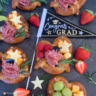 Graduation Charcuterie Pretzels, easy best charcuterie soft pretzels, best individual charcuterie ideas, fun easy grad party food ideas, best ideas for graduation party open house, best easy grad party food recipe, cute pretzel charcuterie ideas