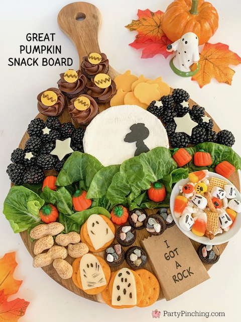 great pumpkin snack board, halloween charcuterie board, halloween snack grazing charcuterie board, charlie brown snoopy linus peanuts great pumpkin halloween food, best halloween peanuts gang party ideas, linus pumpkin patch, brie cheese snoopy, snoopy charcuterie ideas, best snack halloween food for kids