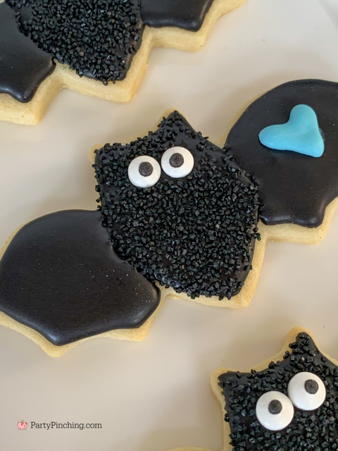 a baby is brewing baby shower Halloween theme for baby boy, cute Halloween baby shower ghost cookies, cute onesie cookies for baby shower, cute mummy cupcake cauldron brownies, cute bat cookies, cute ghost meringue cookies, spider oreos