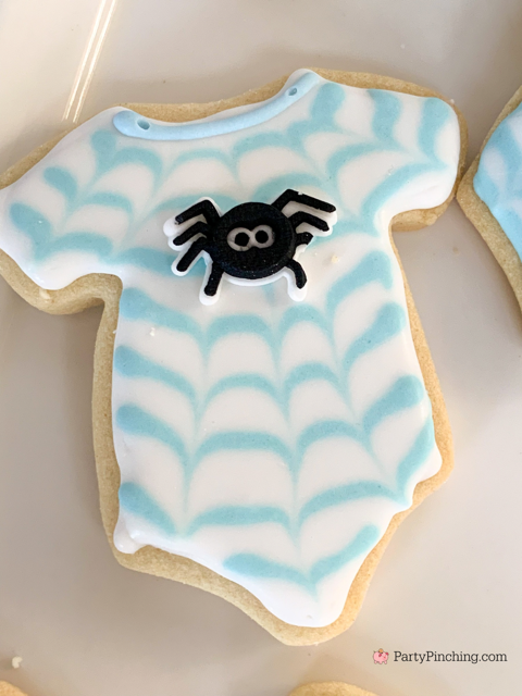 a baby is brewing baby shower Halloween theme for baby boy, cute Halloween baby shower ghost cookies, cute onesie cookies for baby shower, cute mummy cupcake cauldron brownies, cute bat cookies, cute ghost meringue cookies, spider oreos