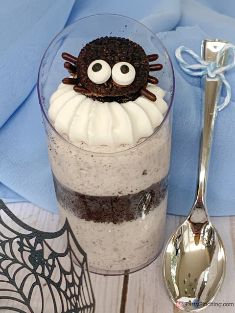a baby is brewing baby shower Halloween theme for baby boy, cute Halloween baby shower ghost cookies, cute onesie cookies for baby shower, cute mummy cupcake cauldron brownies, cute bat cookies, cute ghost meringue cookies, spider oreos