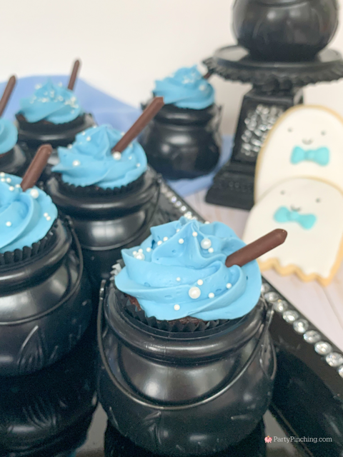 a baby is brewing baby shower Halloween theme for baby boy, cute Halloween baby shower ghost cookies, cute onesie cookies for baby shower, cute mummy cupcake cauldron brownies, cute bat cookies, cute ghost meringue cookies, spider oreos