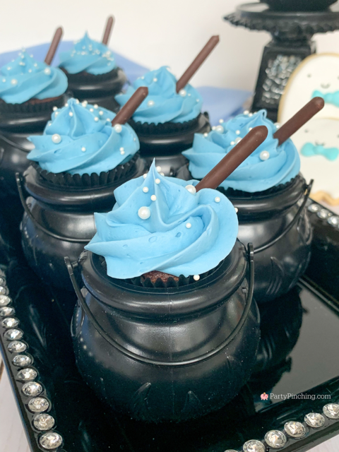 a baby is brewing baby shower Halloween theme for baby boy, cute Halloween baby shower ghost cookies, cute onesie cookies for baby shower, cute mummy cupcake cauldron brownies, cute bat cookies, cute ghost meringue cookies, spider oreos